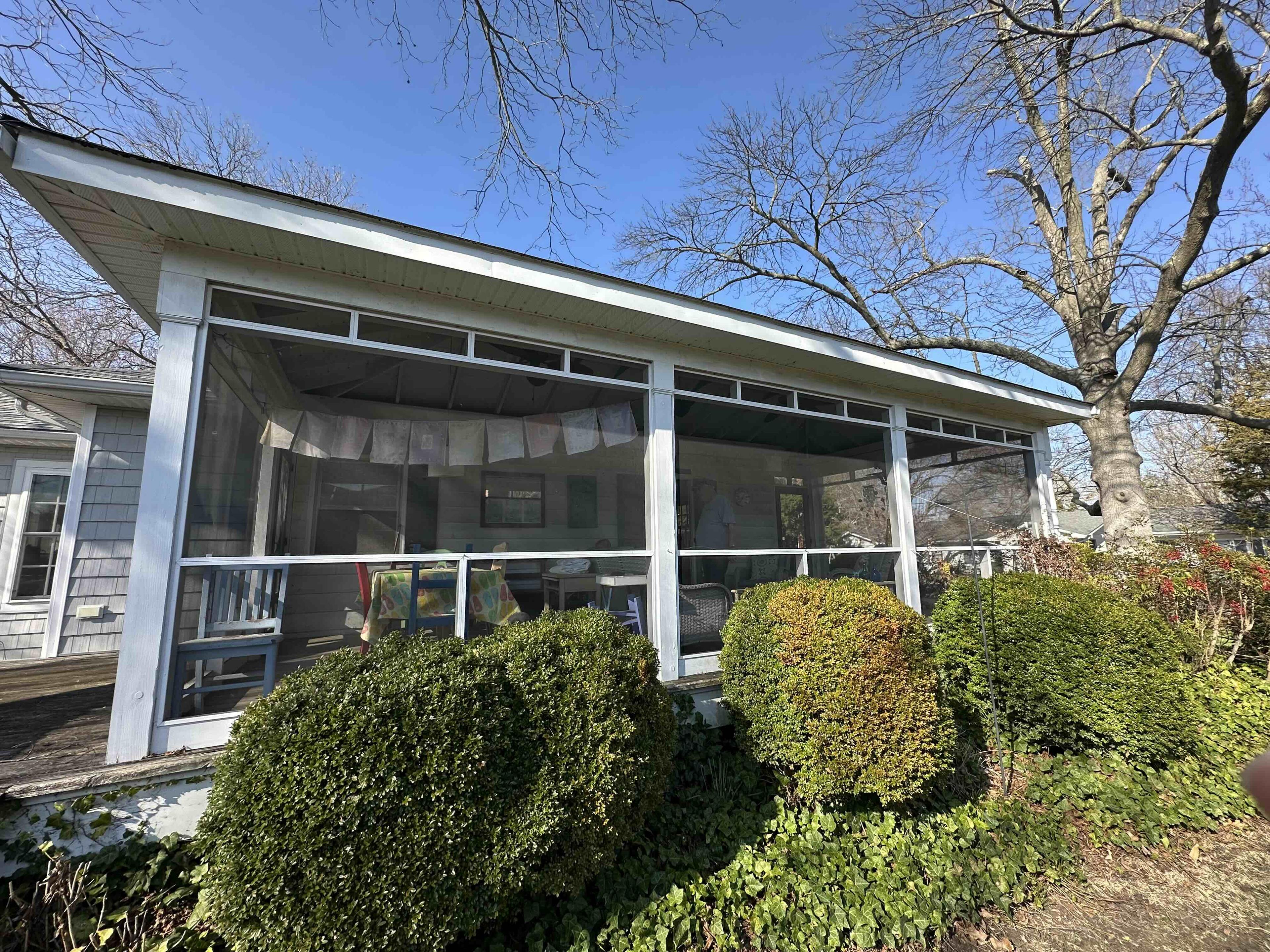 Exterior of the 303 Bonfield porch before renovation